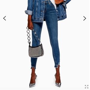 mid blue rip hem jamie jeans